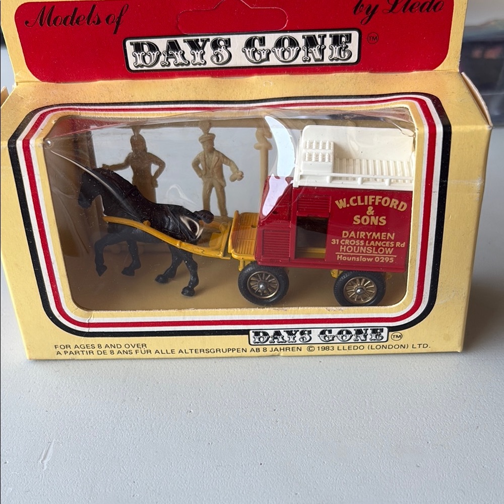 Red and Black Horse-Drawn Dairy Cart